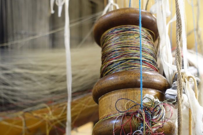 Close up of an old spool of thread
