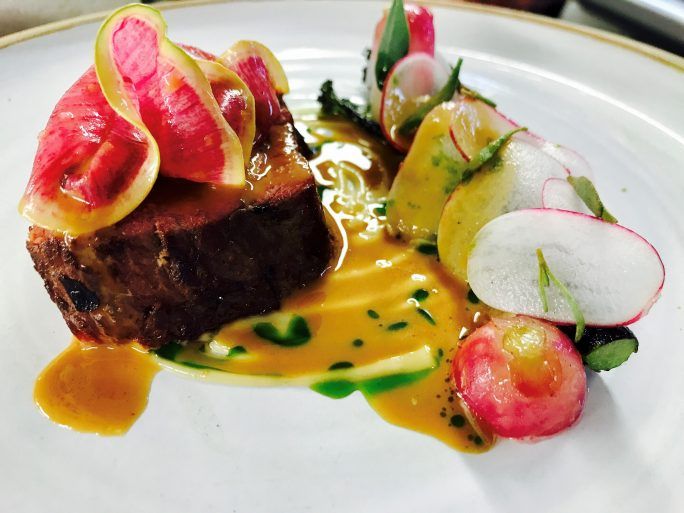A plate of beef and radish prepared by Jamie Scott