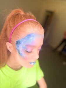 Superhero makeup look for Paisley Halloween Festival