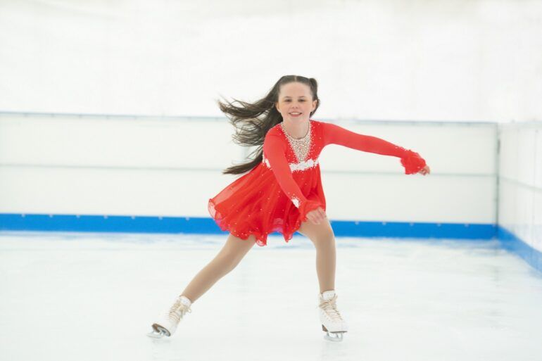 Figure skater Lacey Millar skating on the ice rink at Paisley's Christmas event