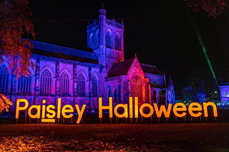 Paisley Halloween Festival sign beside Paisley Abbey. Credit: Stuart White