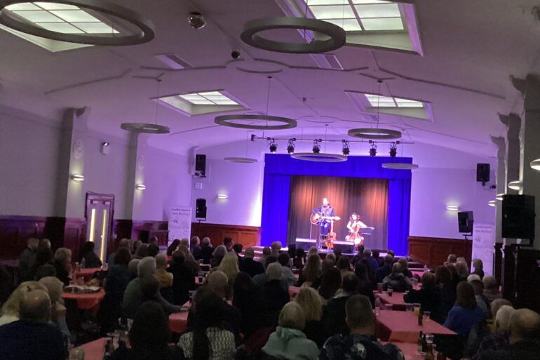Image of performance and crowd at Lochwinnoch Arts Festival event 2022